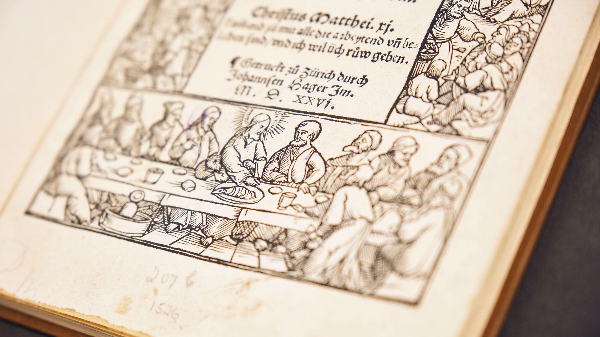 A 1526 woodcut of the Last Supper printed in Zurich, with Gothic German text above.