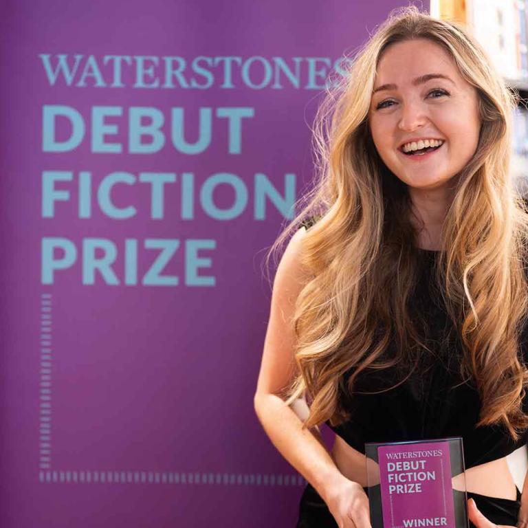 Lucy steeds holding debut fiction prize