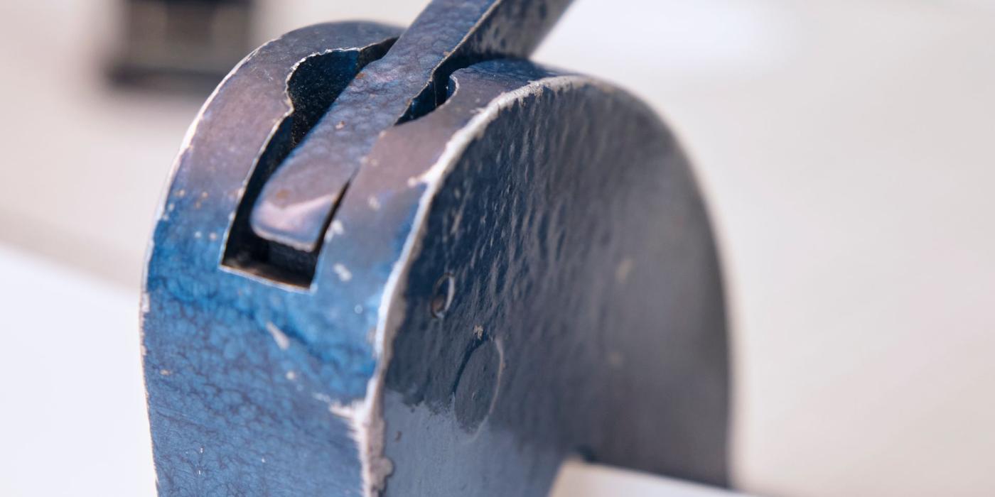A cast-iron embossing press used to stamp the Library's mark into its books.