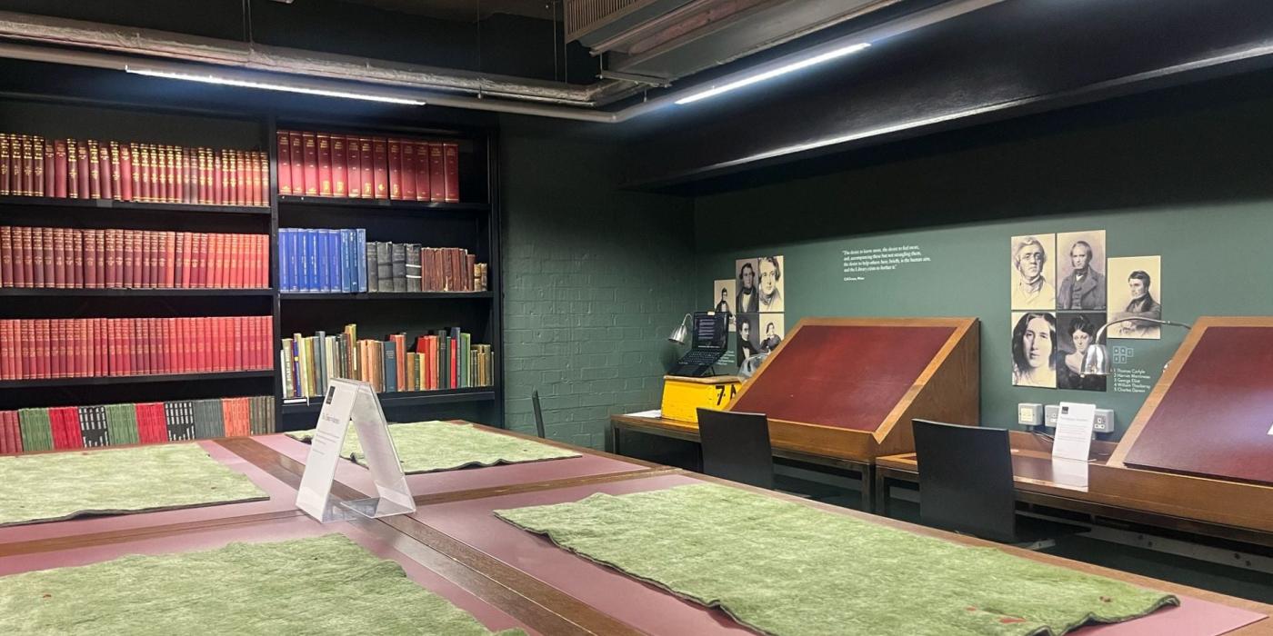 A display case room with information and books