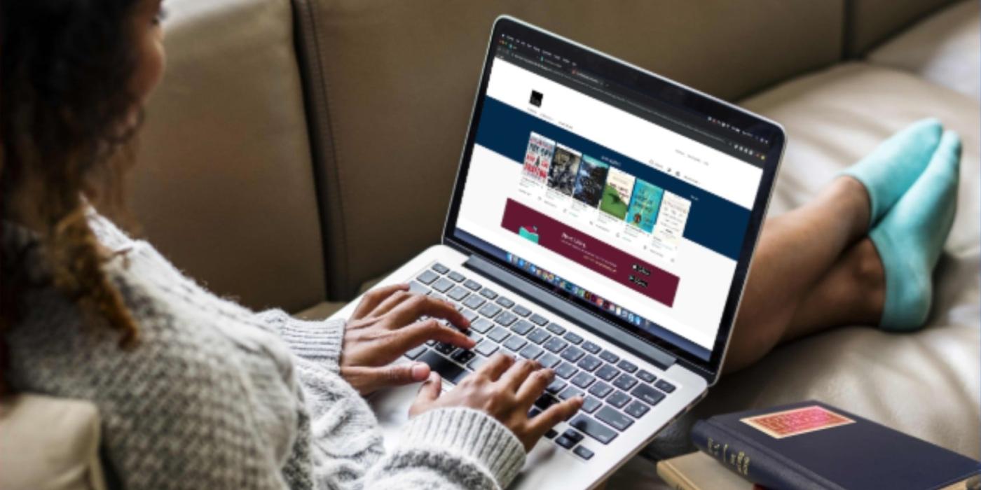 Lady typing on a laptop